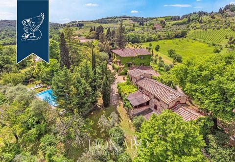 This typically-Tuscan farmhouse girdled by hectares of grounds for sale is nestled in an amazing landscape in the heart of Chianti. This three-floored typically-Tuscan estate sprawls over approximately 720 m² and exhibits bare stone walls studded wit...