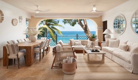 Located in Derricks. Step into Sandy Cove 203, a magnificent beachfront luxury villa on Barbados' West Coast. This fully renovated three-bedroom condo, spanning nearly 3,000 sq. ft., offers modern opulence with breathtaking ocean views and a seamless...