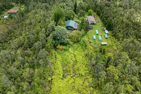 A completely permitted home with 4 acres, (two parcels)! In need of a home studio for music, yoga, hula, art, home gym, daycare, or? This property is set up for just that, formerly used as a recording studio, the downstairs area consists of nearly 1,...