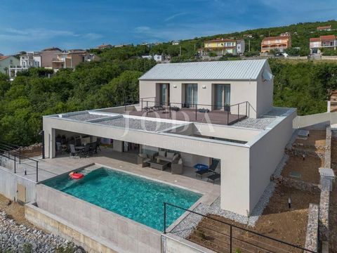 Location: Primorsko-goranska županija, Kraljevica, Šmrika. MODERN VILLA WITH THE MOST BEAUTIFUL VIEW OF KVARNER We are selling a beautiful and unique villa located on a plot of 615m2 at the very end of a dead end street in Šmrika. The villa is spread...