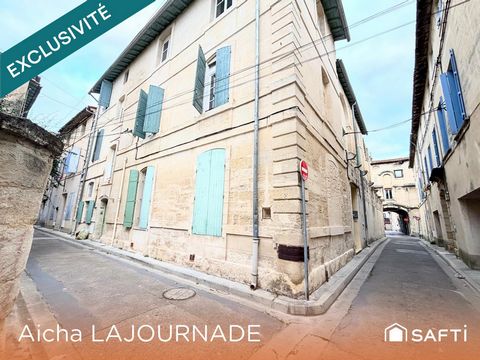 IMMEUBLE LOCATIF: APPARTEMENTS ET GARAGES!