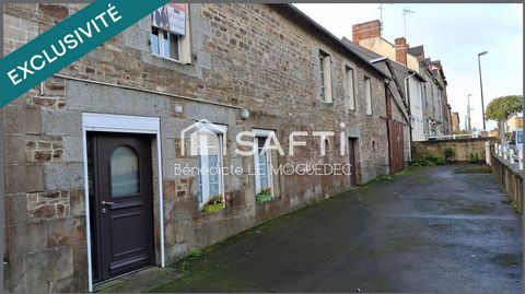 Longère en pierre à rénover, garages et cellier- centre bourg.