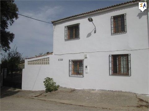 Semi-detached Cortijo with extensive land of 10,645m2 is situated in the countryside near Fuensanta de Martos, in the Jaen province of Andalucia with 80 olive trees which bring in an annual income along with various others such as almond trees and fi...