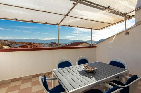 The island of Krk, Baška, furnished apartment surface area 105.54 m2 for sale, in a high attic with sea view. The apartment consists of living room with kitchen and dining area, three bedrooms witch one of them has a balcony, bathroom, toilet, hallwa...