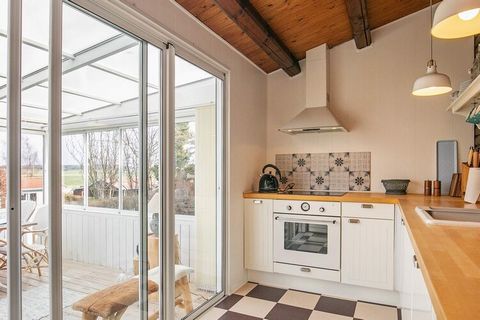 This cottage is located in the attractive cottage area just a short walk to Kerteminde town center as well as a good and child-friendly beach. There is a combined living / dining room furnished with furniture in the best Danish quality. The kitchen d...