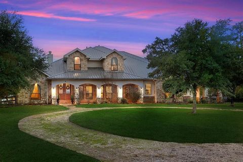 Exceptional custom home on 10 acres in Tomball! Gated entry, Mueller metal roof w/lifetime warranty, new AC units, central vacuum system, 3 fireplaces, 36'x48' barn w/6 stalls, water well, 3 car attached garage w/workshop, and so much more. Horses we...