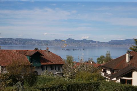 AgenceImmo Maret-Bonvin offers: In the town of Neuvecelle near Evian Les Bains, in a very quiet area, beautiful house with LAKE VIEW, offering very large volumes with a total area of 325 m2, located on a plot of 1851 m2 with swimming pool The house o...