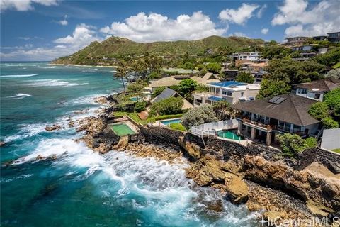 *Priced below appraised value* Priced to sell. Seize this opportunity to own an oceanfront property on one of the most coveted streets of Oahu. This home is a diamond in the rough just waiting for someone to tap into its potential. Create your own oa...