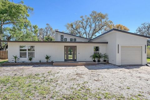 One or more photo(s) has been virtually staged. You must see this stunning, fully renovated, 3 bedroom 2 bath contemporary home in the heart of Sarasota!! This open concept home has a minimalist organic design featuring soaring 20