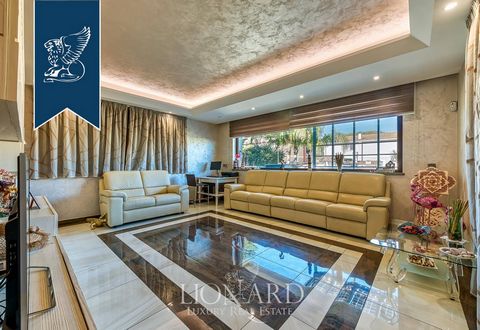 Extraordinary modern villa of 500 square meters on three levels, surrounded by a large garden of 800 square meters with an enchanting swimming pool, on sale in an elegant residential context in the X Town Hall of Rome, in Casal Palocco. The modern an...