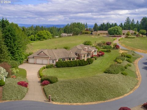 Welcome to your wine country paradise! Nestled serenely upon a hilltop cul-de-sac, this stunning residence boasts breathtaking panoramic valley views and gorgeous view of Mount Hood. The luxurious amenities are sure to impress, starting with the gran...