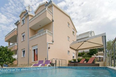 Apartment villa of 3 apartments with swimming pool  in a quiet environment 400 meters from the beach and crystal clear sea on the island of Čiovo peninsula. Ciovo, formerly an island near Trogir, is now connected by two bridges to the mainland and ha...
