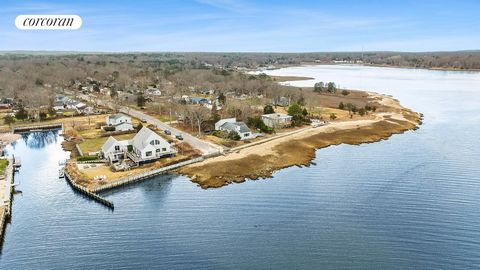 Embrace the essence of waterfront living in this delightful ranch-style home, with garage, nestled along the picturesque shores of the Great Peconic Bay. Boasting breathtaking panoramic views and a host of desirable features, this residence offers a ...