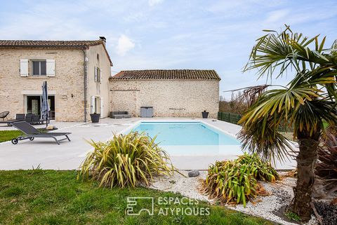 Located in the town of Fénols, this old farmhouse has benefited from a total quality renovation. Located on a plot of nearly 7 hectares fully fenced, the building offers a living space of 308 m2 spread over two levels. The entrance opens onto the bri...