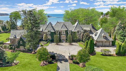 Magnificent one of a kind Riverside Estate designed by award winning architect Douglas Vanderhorn showcases sweeping waterviews and stunning interior brimming with classical elements and luxurious finishes. This thoughtfully 2008 custom built home bo...