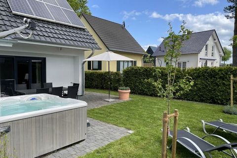 Maison de vacances de luxe avec jardin clôturé, bain à remous, sauna, cheminée et spacieuses places de parking privées