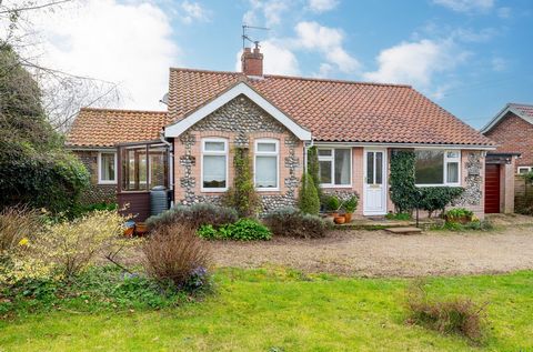 Set back from the road and sheltered from view by a hedgerow, this attractive brick and flint detached bungalow is located in the heart of the popular North Norfolk village of Bale. The living space comprises two/three bedrooms, a family bathroom, a ...