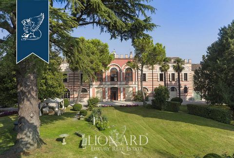 This luxury property for sale is located in one of the most beautiful hamlets in Italy, close to the city of Mantua and just a few kilometers from the Lake Garda. The castle's 2,500 m2 surface is spread over two floors, decorated with a clear ec...