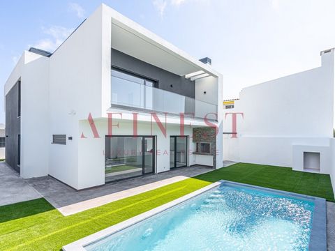 CONTEMPORARY 4 BEDROOM DETACHED VILLA WITH GARDEN AND POOL The areas of the house are distributed as follows: Entrance floor (109m2): Hall (4m2) Living Room (53.50m2) Kitchen (15.20m2) in open-space lacquered MDF with Silestone worktop, fully equippe...