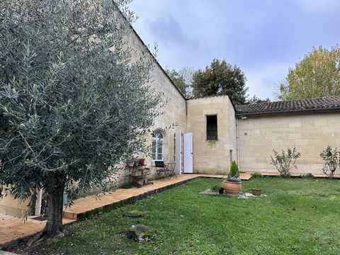 L'Immobilière de Larroche Baron is pleased to offer for sale near the city center of Arveyres, and 15 minutes from Libourne / 30 minutes from Bordeaux, this magnificent Gironde stone house with a surface area of 320m2, accompanied by its two outbuild...