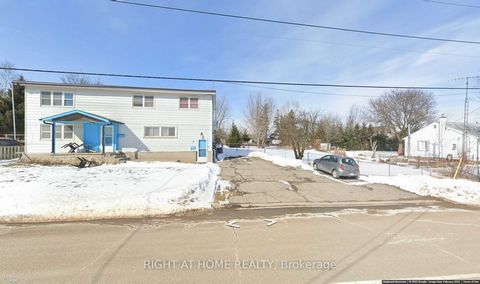 DEVELOPMENT Opportunity In Growing Milton Just under 1/2 Acre Lot across from Kelso. Zoning FUTURE DEVELOPMENT. Potential For Land Assembly. Currently tenanted with rental income from upper and lower units. Minutes From Schools, Shopping, Dining, And...