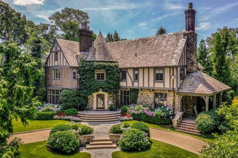 A majestic move-in ready French Normandy Tudor that boasts tremendous flexibility in layout, adaptable spaces and every modern convenience. Recent structural renovations and fresh cosmetic restorations to inside & out establish this 1927 home as a ti...