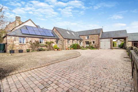 This charming, four-bedroom barn conversion sits in glorious, well-planned gardens, with outstanding rural views. It enjoys the added benefit of horse paddocks and stabling, making it ideal for a family wanting to keep horses. Situated in peaceful Vi...