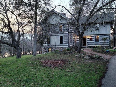 RUSTIC, 7.5 Acres ESTATE located on BIG CEDAR LAKE. The LOG HOME, was originally built about 1870 and moved to its current location on the preferred Eastern Shore. 120 Ft. of LAKE FRONTAGE. ENJOY PRIVATE UP NORTH BEAUTY! Property includes a 6+ car de...