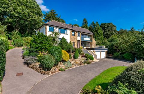 An excellent opportunity to purchase this impressive four bedroom detached home with engineered wood flooring throughout the ground floor, sitting within an enviable plot, measuring in at almost two acres, in this exclusive residential village of Haw...