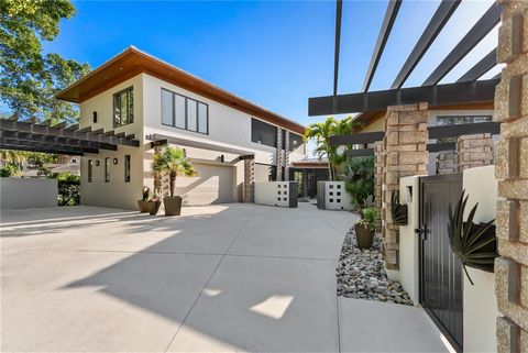 This unique home is designed to assemble your family and friends, to share good food, and to enjoy the good life. Esteemed architect John Potvin imagined three separate buildings connected by covered lanais to provide complete privacy when desired, b...
