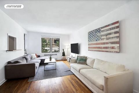 This generously proportioned south/east facing 2 BR/1 BA home is located at 54 East 8th Street, a well maintained co-op building, nestled in the heart of Greenwich Village. The home features a spacious living room and dining alcove that is the perfec...