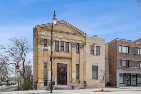 Rare on the market commercial condo in historic bank building. Excellent location with over 1300 square feet of space on street level plus basement level. Beautiful open space with 13 foot ceilings and original moldings. Updated electrical system amo...