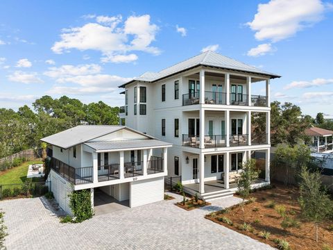 Perfectly positioned in Seagrove Beach, this compelling new construction opportunity sprawls along 75' of Tresca Lake frontage framed by the picturesque landscape and idyllic Gulf views. Designed by the acclaimed Gregory D Jazayeri, the floor-plan en...