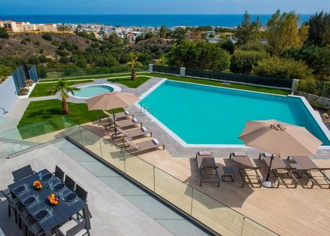 Nestled on a 1,300 sq.m. plot with breathtaking views of the Aegean Sea and the picturesque harbor of Hersonissos, this 330 sq.m. luxury villa offers an idyllic blend of minimalism and modern elegance. Spanning three floors, it provides a serene retr...