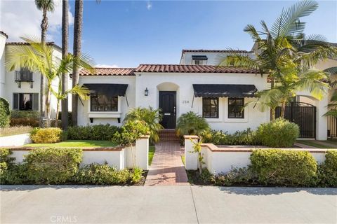 Welcome to this stunning 4-bedroom, 3-bathroom Spanish-style home in the heart of Belmont Heights. Spanning 2, 102 square feet, this residence blends timeless charm with modern updates, offering a perfect retreat for comfortable and stylish living. I...