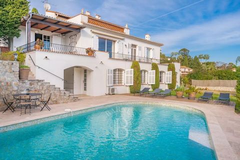 Vallauris: located in the prestigious Cannes Eden district, with panoramic views of the islands and Cap d'Antibes, south-facing, in absolute calm and just a few minutes from the center of Cannes. The villa extends over 435 m² and comprises an entranc...