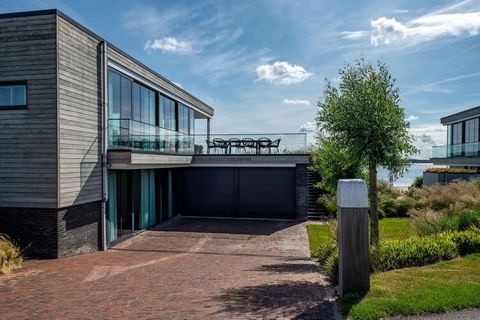 This detached, spacious, luxurious and modern water villa is situated in Harbour Village, located by Lake Veere in Arnemuiden, in beautiful Zeeland If you are looking for an exclusive villa to spend your well-deserved holiday, you can stop searching....