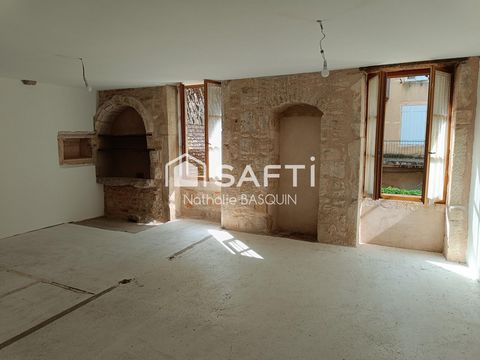 Proche Buxy, immeuble avec appartement et local commercial loué.