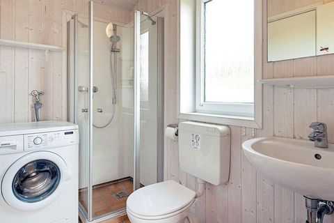 Comfortable and brightly decorated wooden holiday home in Scandinavian style located in the popular OstseeStrandpark Grömitz near the lovely Baltic Sea sandy beach in the holiday area Lensterstrand. The open and well-equipped kitchen offers good oppo...