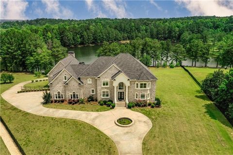 Sophisticated Elegance can be found in this Spectacular one-of-a-kind Loganville Estate. Conveniently located off 1-20, 35 mins east of Downtown Atlanta. This impressive gated estate has 2.5 acres with breathtaking view of the lake. As you enter, you...