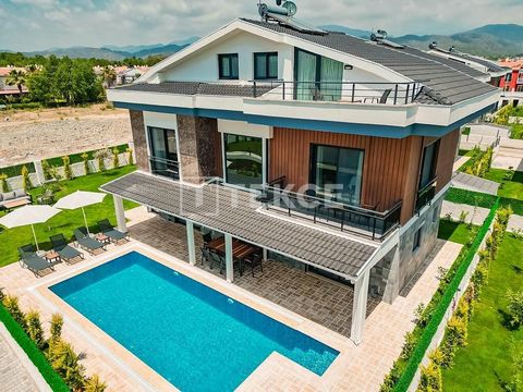 4+1 Houses within Walking Distance of the Beach in Fethiye Muğla Muğla has attracted great attention with its prestigious housing projects. The province offers the most beautiful views of the Mediterranean. Fethiye is one of the most preferred distri...