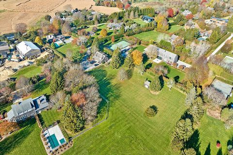This expansive 3.10+/- acre lot presents an exceptional opportunity to either renovate the current home or construct a custom compound in one of the most desirable areas of the Hamptons. Boasting a rectangular shape, the property features rolling law...