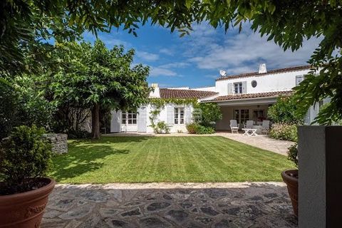 Village center - Rare In the heart of Les Portes, just a stone's throw from the market, this pretty village house is built on a beautifully landscaped plot and comprises: large reception room with fireplace, separate fitted and equipped kitchen, 6 be...