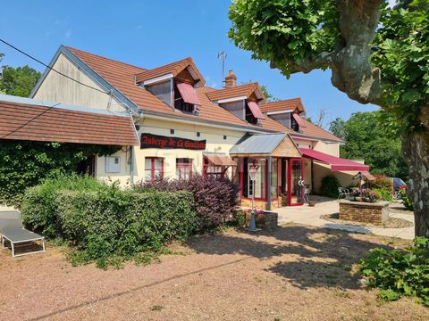 REF 18615 LG - Near CHAUSSIN - Good general condition for this stone building consisting of a restaurant business currently in operation, a type 4 apartment of 115 m² and an adjoining outbuilding of approximately 65 m² with a fitted studio of 25 m². ...