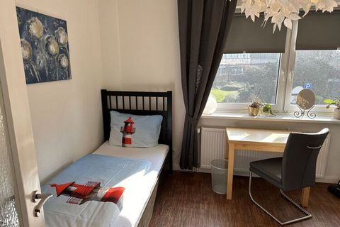 The 3 room holiday apartment has 2 real bedrooms. Both rooms are structurally and spatially apart. There is a large double bed 180x 200 in a bedroom and there are 2 single beds in the 2nd room. There is a large dining table in the living room where y...