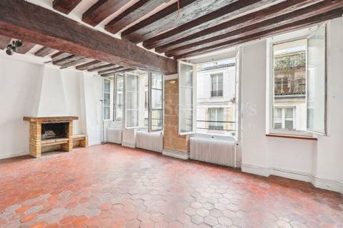 Located in the heart of Île Saint-Louis, in a beautiful renovated 17th-century building, on the 3rd floor without an elevator, is an apartment of 87.17 sq.m. (936.96 sq.ft.) under the Carrez law and 101.32 sq.m. (1,090.44 sq.ft.) in total, retaining ...