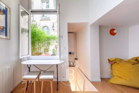 BARNES is listing this magnificent 35m² or 377 sq ft (Carrez law) triplex apartment with the feel of a house in a beautiful 1780s condominium. The apartment comprises an entrance hall opening onto an open kitchen and dining area. Large living room an...
