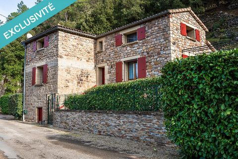 07140:Exclusivity. In a quiet area near river on foot and hiking trails, an independent stone house of 144 m2* with garage located less than 5 minutes commodites.Spacious and comfortable this house, full of charm, presents beautiful volumes and a pre...