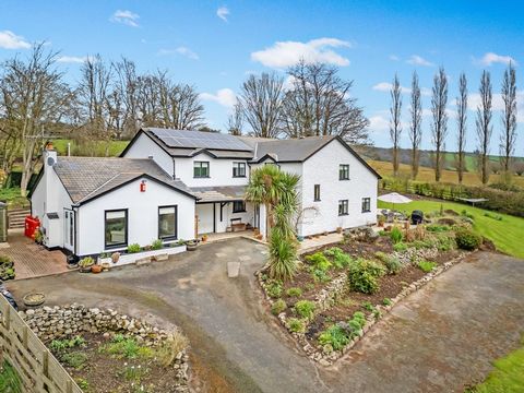 Commanding outstanding views over the Monmouthshire countryside, this comfortable and very well-presented family home occupies an elevated spot on the edge of the highly desirable village of Bettws Newydd, overlooking extensive, landscaped gardens. B...