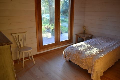 The white room is very cozy and full of light with a beautiful view to the outside. The big window goes direct to the terrace. The room has a dresser and a clothes rack. If you are looking for a place of peace and tranquility, surrounded by nature, y...